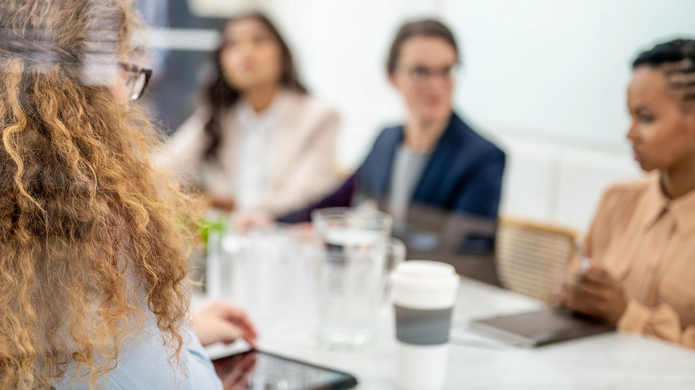Business team meeting around a conference table